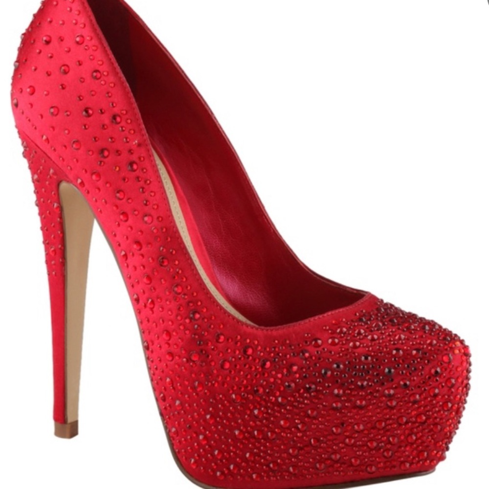 Red Sparkle ALDO pumps. Unworn with protective covers and box. Size 6.5